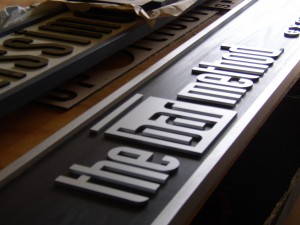 The Bar Method Fascia sign - still on the table